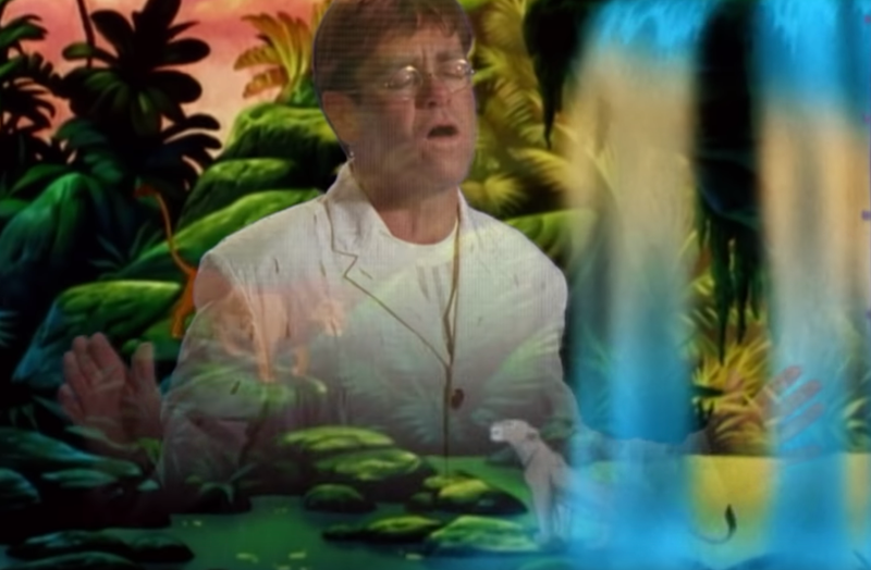 Illustration for article titled 10 Iconic Screenshots from Elton John's 'Can You Feel the Love Tonight' Video